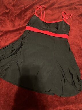 Classic Black Swimdress with Red Trim and Built-In Support